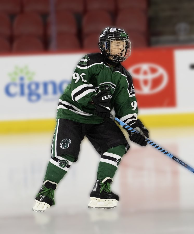 Hockey skater number 90 reading the play